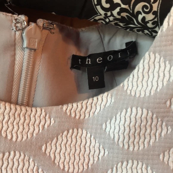 This is a very flattering dress and the textured design is gorgeous and unique. - Picture 2 of 3